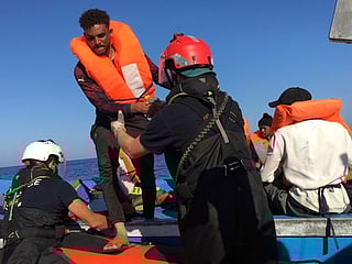 'I'm going to jump': Tensions running high on migrant rescue ship