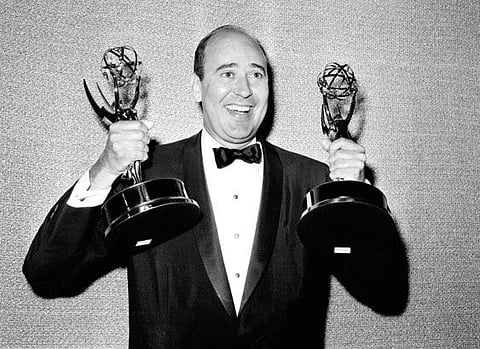 In this May 26, 1963 file photo, Carl Reiner shows holds two Emmy statuettes presented to him as best comedy writer for the "Dick Van Dyke Show," during the annual Emmy Awards presentation in Los Angeles.