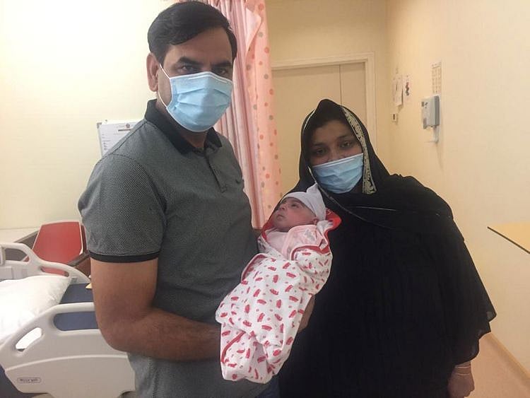 The baby girl with her parents