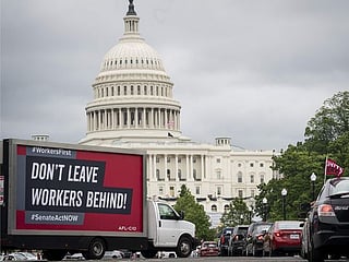 US payroll growth slows and jobless rate ticks up to 4.1%