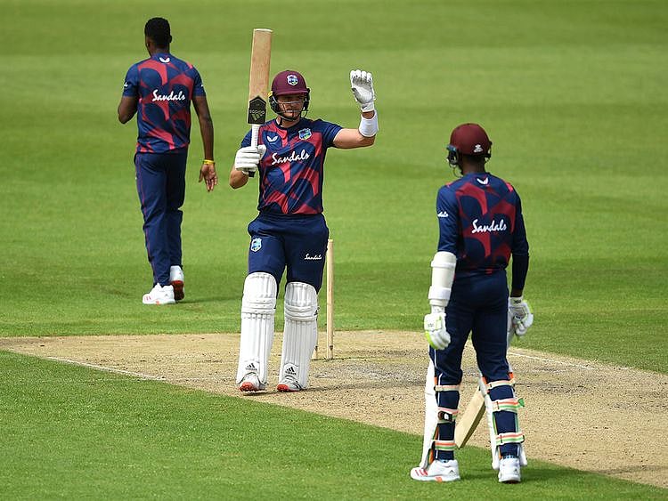 West Indies Joshua Da Silva celebrates reaching his century during day three of a West Indies Warm Up match at Old Trafford in Manchester, England, Wednesday July 1, 2020. England are scheduled to play West Indies in their first international Test match on July 8-12. (Gareth Copley/Agency Pool via AP)