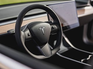 Tesla rolls out advanced self-driving functions in China