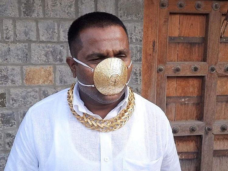 Pune man wears a gold mask
