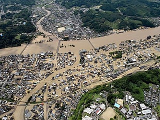 Photos: Heavy rain floods southern Japan, over a dozen presumed dead