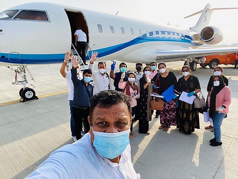 A group of 13 Indians who recently flew back to the UAE on a private jet fro India. 