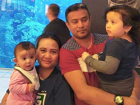 Shihabdeen with his wife and two kids