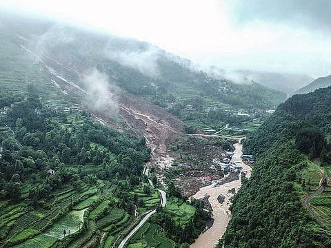 This aerial photo taken on July 8, 2020 shows the scene of a landslide in Songtao Miao autonomous county, Tongren city, in China's southwestern Guizhou province.