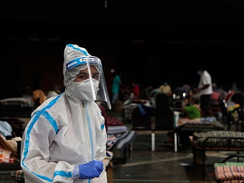 A doctor works at an COVID-19 isolation centre in Mumbai, India, Wednesday, July 8, 2020. 