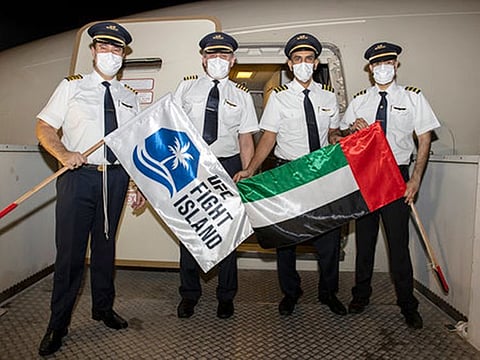 Etihad Airways flight crew pictured after landing at Abu Dhabi International Airport.