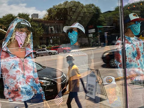 Mask-wearing mannequins at a store in Austin's South Congress neighbourhood.
