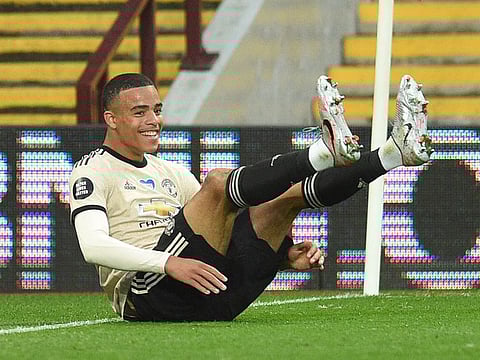 Manchester United's Mason Greenwood celebrates scoring their second goal.