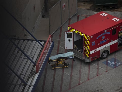 An ambulance sits outside the emergency room at Houston Methodist Hospital in the Texas Medical Centre in Houston on July 6, 2020. Intensive Care Units are reaching capacity. Nurses are falling sick, contributing to shortages. The new coronavirus spikes are challenging hospitals across the US.