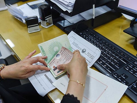 Staff at the General Directorate of Residency and Foreigners Affairs office in Dubai. 