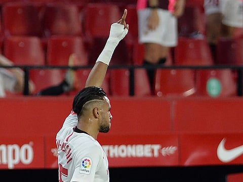 Sevilla's Moroccan forward Youssef En-Nesyri celebrates.