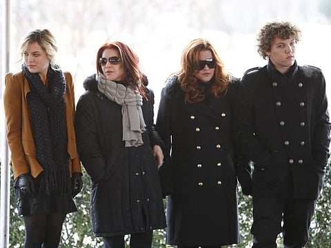 Priscilla Presley (second from left), her daughter, Lisa Marie (second from right) and Lisa Marie's children, Riley Keough, 21, (left) and Benjamin Keough, 18 (right) take part in a ceremony commemorating Elvis Presley's 75th birthday on Friday, January 8, 2010 in Memphis.