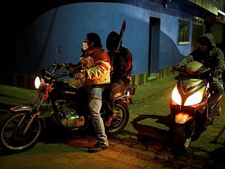 Photos: Armed civilians enforce coronavirus curfew in Guatemala