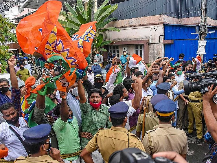 BJP workers Kerala protest Swapna Suresh