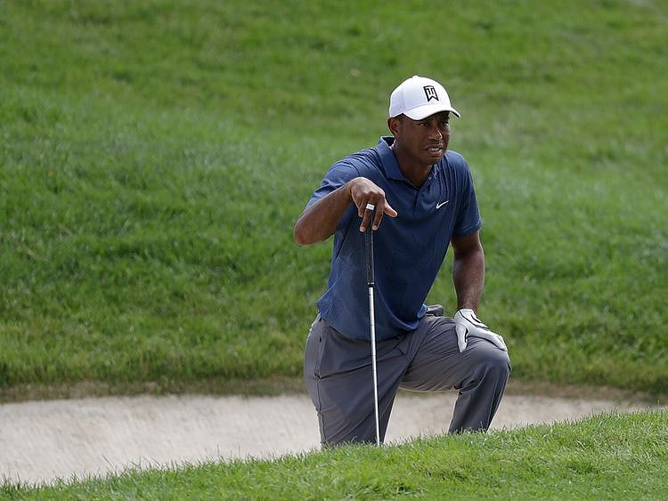 Tiger Woods looks toward the fourth hole during the second round of the Memorial golf tournament, Friday, July 17, 2020, in Dublin, Ohio. (AP Photo/Darron Cummings)