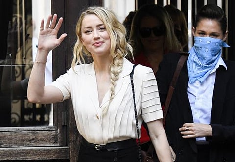 Amber Heard arrives at the High Court, in London, on July 20.
