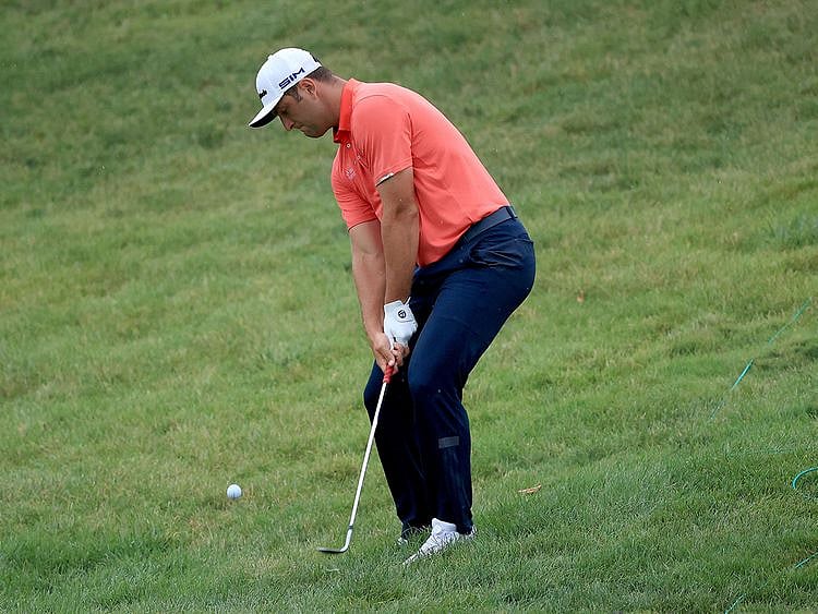 Jon Rahm chips in for birdie on the 16th hole during the final round of The Memorial Tournament at Muirfield Village Golf Club in Dublin, Ohio