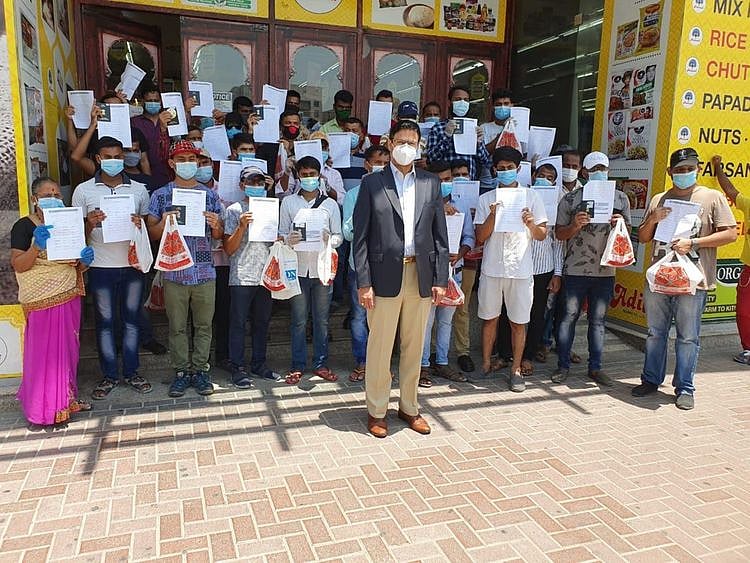 NAT 200721 Dr. Dhananjay Datar with workers 1-1595318711010