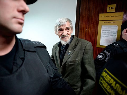 Russian historian Yury Dmitriyev, who heads rights group Memorial's branch in Karelia, arrives for the verdict in his child pornography trial at a court in the city of Petrozavodsk in northwestern Russia. 