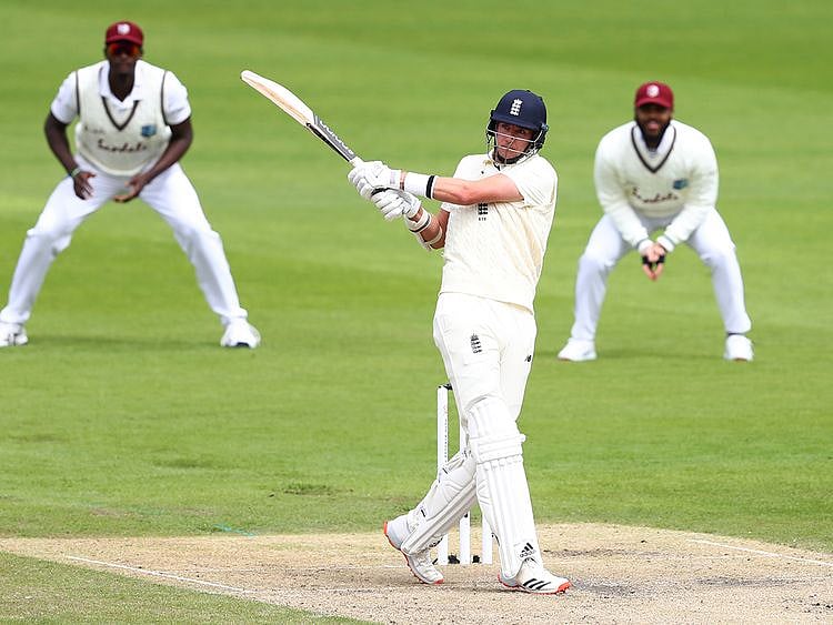 England's Stuart Broad plays a shot during the second day of the third cricket Test match against West Indies at Old Trafford.