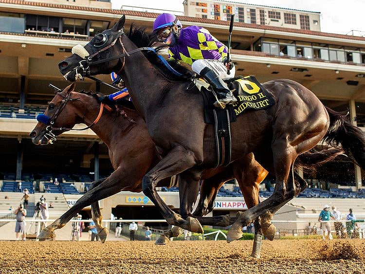 In this image provided by Benoit Photo, Maximum Security, outside, with Abel Cedillo aboard, overpowers Midcourt, inside, with Victor Espinoza aboard, to win the Grade II, $150,000 San Diego Handicap horse race Saturday, July 25, 2020, at Del Mar Thoroughbred Club in Del Mar, Calif. (Benoit Photo via AP)