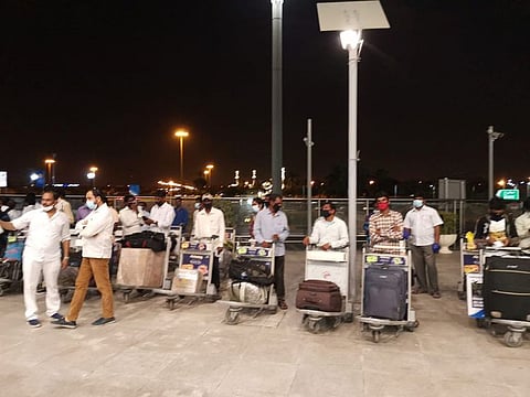Forty stranded Indian workers flew home from Sharjah to Hyderabad on Saturday on an Air India repatriation flight .