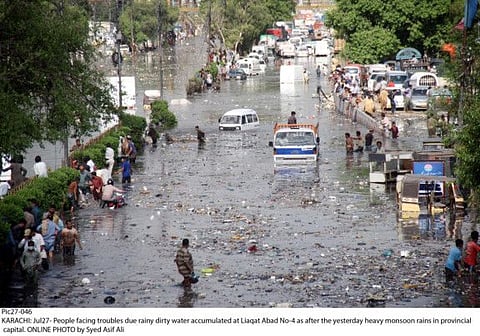 Normal life is thrown out of gear after heavy rains lead to flooding in Karachi.