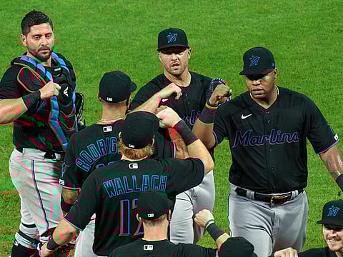 Miami Marlins' Jesus Aguilar, right, celebrates a 5-2 win with teammates following a baseball game against the Philadelphia Phillies in Philadelphia on July 24.