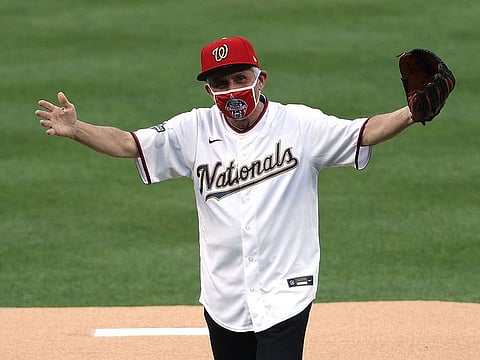 Dr. Anthony Fauci, director of the National Institute of Allergy and Infectious Diseases reacts after throwing out the ceremonial first pitch prior to the game between the New York Yankees and the Washington Nationals at Nationals Park on July 23, 2020 in Washington, DC.   