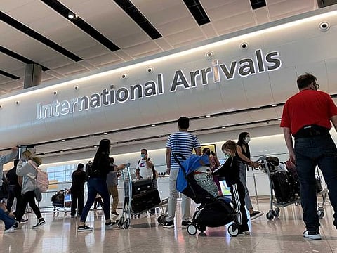 Passengers from international flights arrive at Heathrow Airport, following the outbreak of the coronavirus disease (COVID-19), London, Britain, in this file photo taken on July 29, 2020. 
