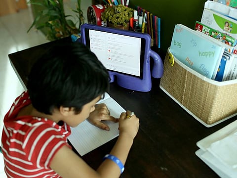 A student attends a distance-learning programme.