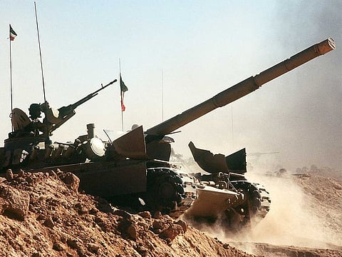  A Kuwaiti M-84 main battle tank crosses a trench during a capabilities demonstration at a Kuwaiti outpost during the war with Iraq 