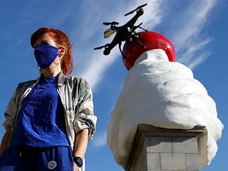 Photos: Ominous whipped cream art comes to London's Trafalgar Square