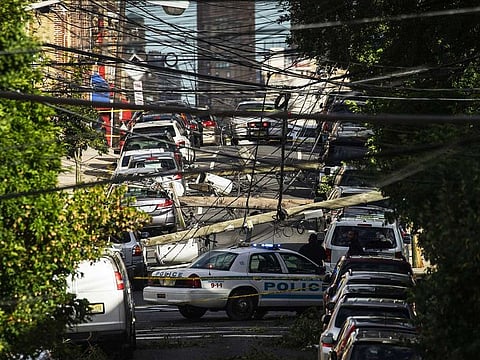 Power lines criss-cross at street level after Tropical Storm Isaias and its high winds heavy rain passed through on August 4, 2020 in Guttenberg, New Jersey. 