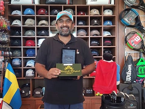Samvit Chopra poses with the winner's trophy of July Bogey competition.