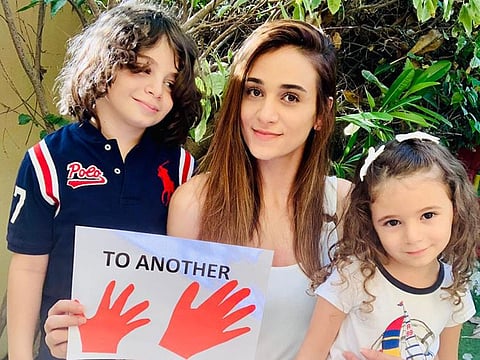 Lebanese mum Reneva with her two kids