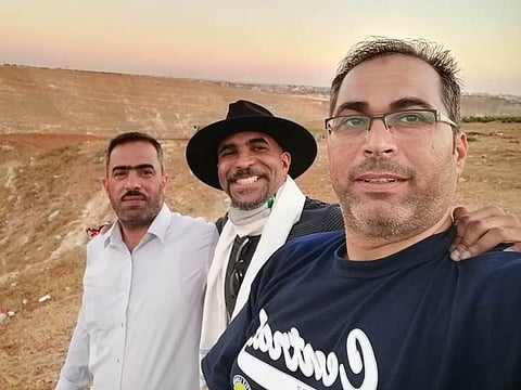 UAE-based actor Rik Aby (centre) with friends in Jordan. He has been stranded there since March due to COVID-19 travel restrictions. 