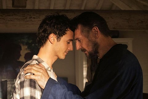This image released by IFC Films shows Michael Richardson, left, and his father Liam Neeson in a scene from "Made In Italy." They play father and son in the film but their characters are dealing with the loss of their wife and mother. Neeson's wife and Richardson's mother, Natasha Richardson, died over a decade ago in a skiing accident.
