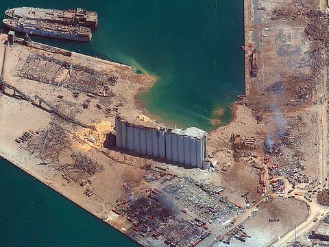 This satellite image provided by Maxar Technologies shows the port of Beirut in Lebanon on Wednesday, Aug. 5, 2020, the day after a massive explosion that left entire city blocks blanketed with glass and rubble.