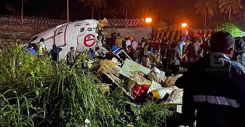 The Air India Express aircraft after the crash at the airport in Karipur on Friday. 