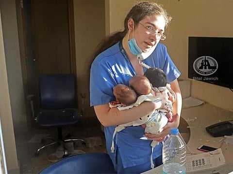 Nurse as she try to save three new born from blast