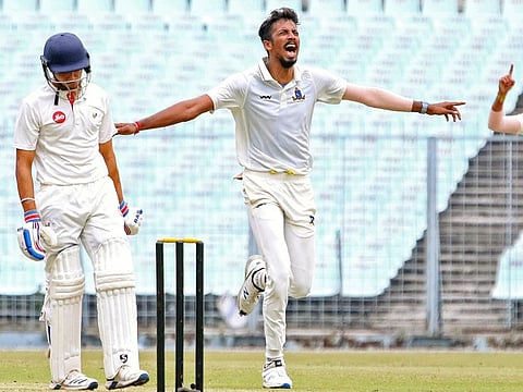 Ishan Porel, Bengal's pace lynchpin, celebrates the fall of a wicket during his state's Ranji Trophy campaign earlier this year.
