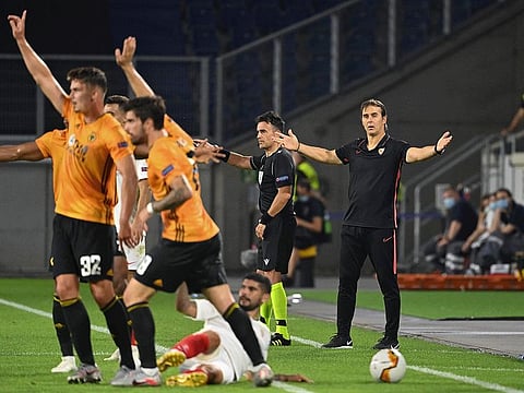 Sevilla's Spanish coach Julen Lopetegui reacts from the sidelines during their Uefa Europa League quarter final against Wolverhampton Wanderers at the MSV Arena in Duisburg, western Germany on Tuesday. 