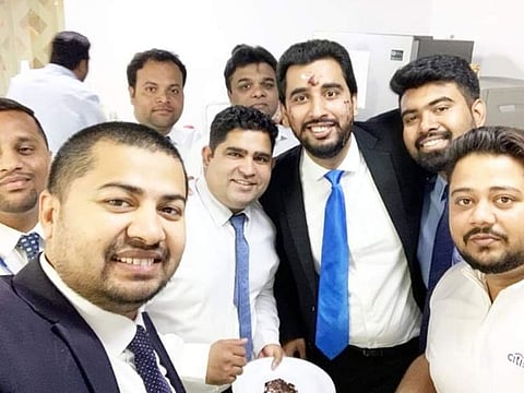 Danish Sheikh (third from right) with his colleagues