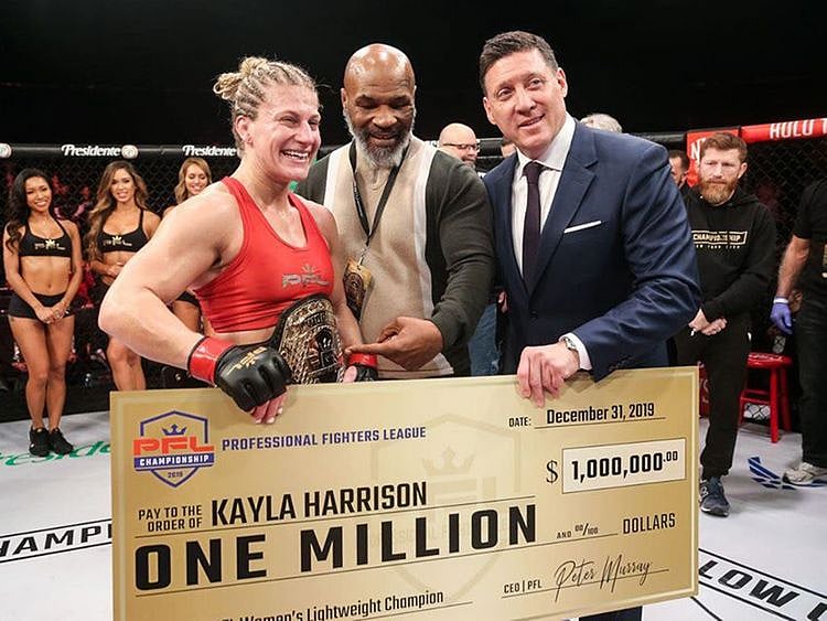 PFL champion Kayla Harrison, with boxing legend Mike Tyson and PFL CEO Peter Murray