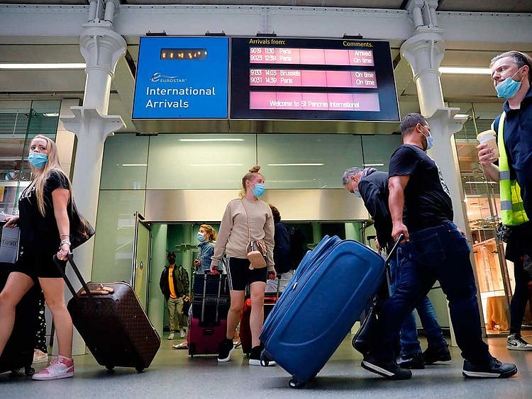 Arrivals facemasks UK London airport