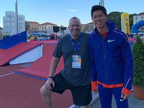 Filipino pole vaulter Ernest John Uy Obiena with Dubai-based coach James Michael Lafferty